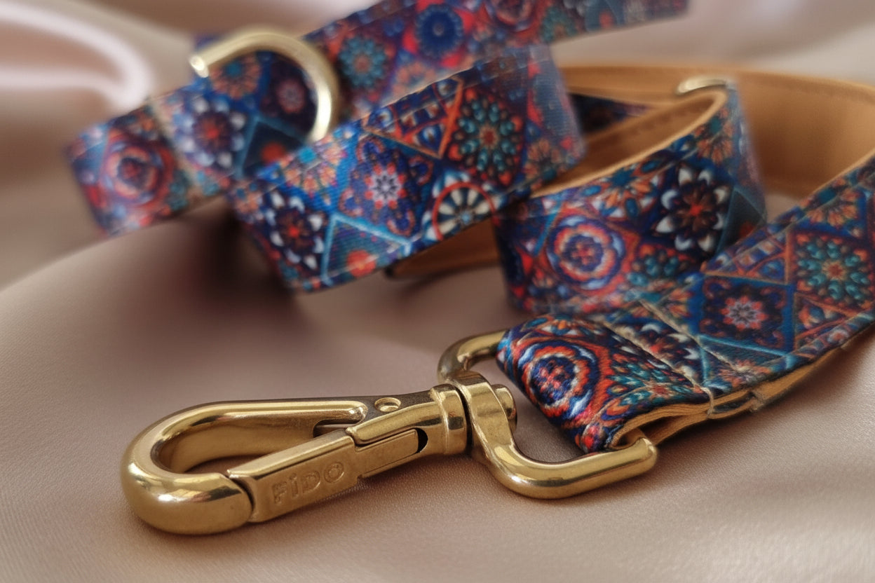 close up of solid brass clip on patterned dog leash