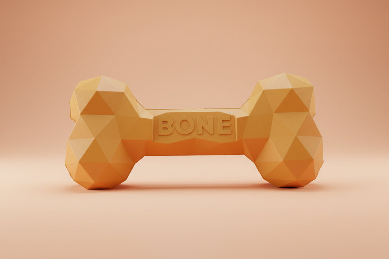 A yellow-orange low-poly bone-shaped dog toy with the word 'BONE' embossed on the center.